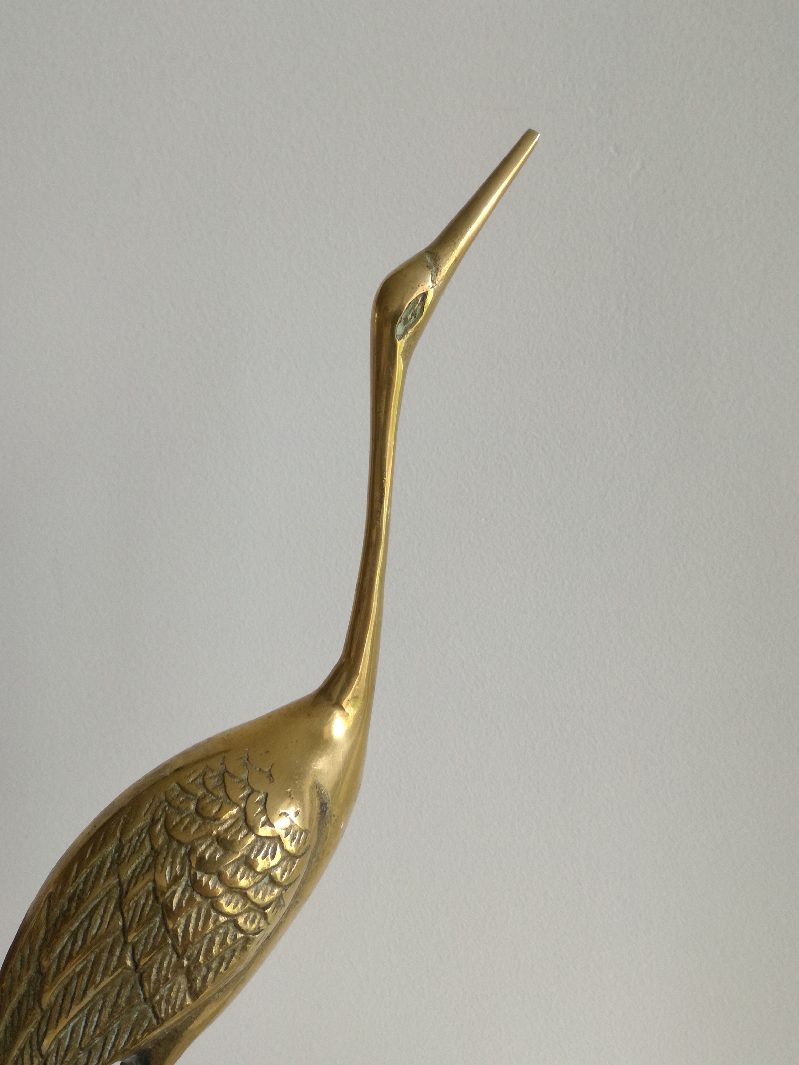 Heron vintage brass