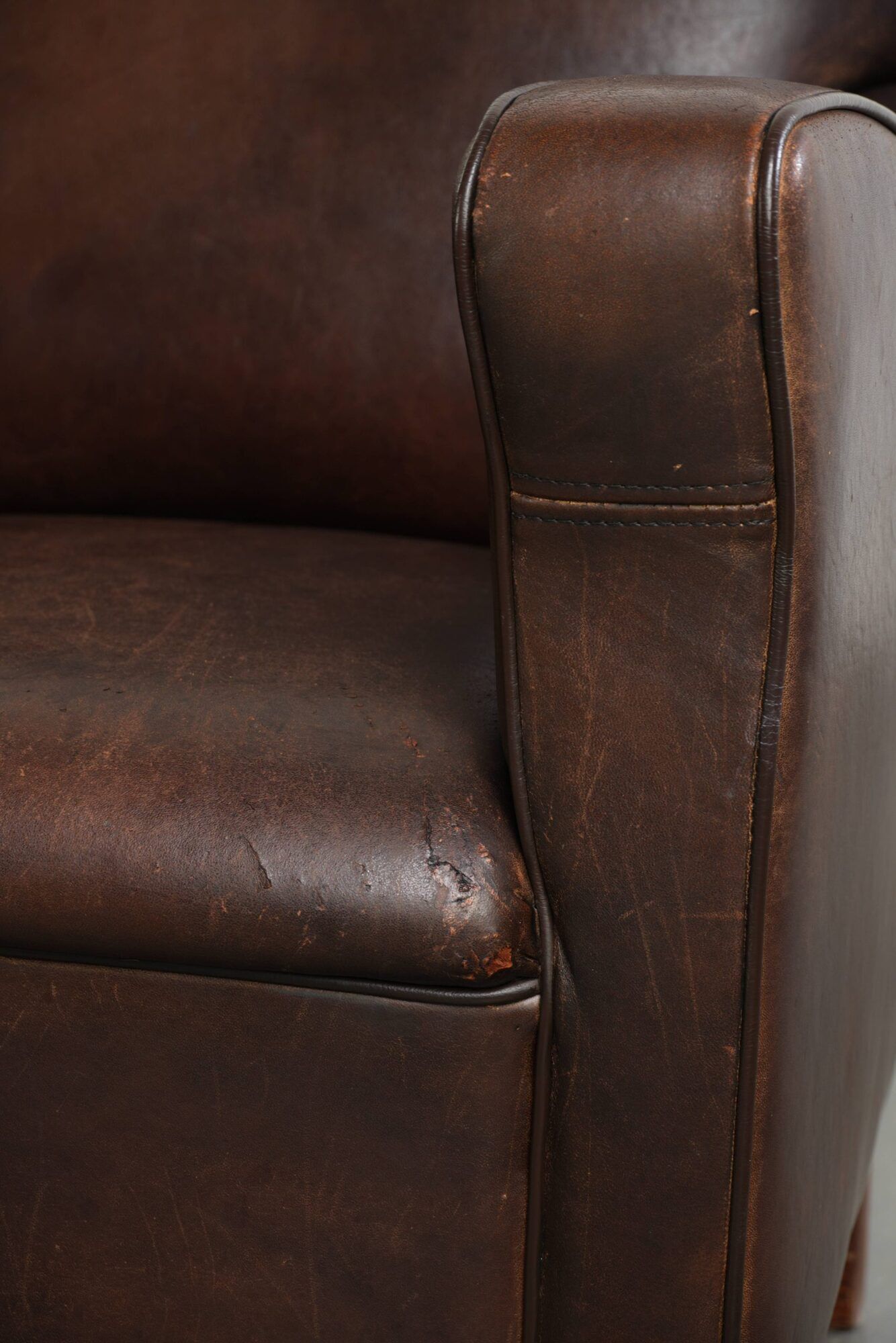 Sturdy set of vintage sheepskin armchairs in a beautiful dark colour