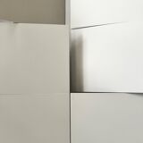 Modernist wall lamp with white metal shade, design by C. Grandidier.