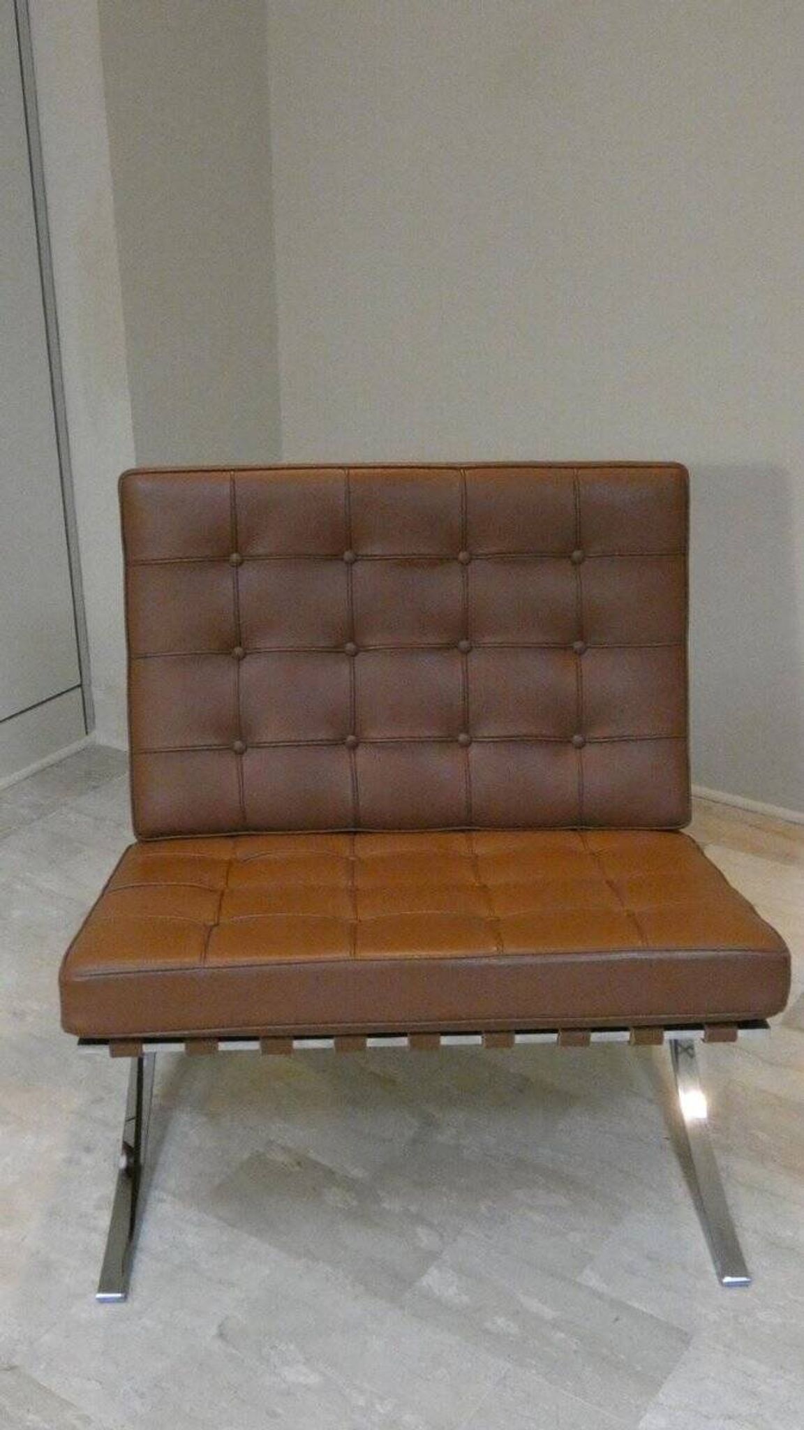 Steel and leather chair in the style of Knoll, 1980s.