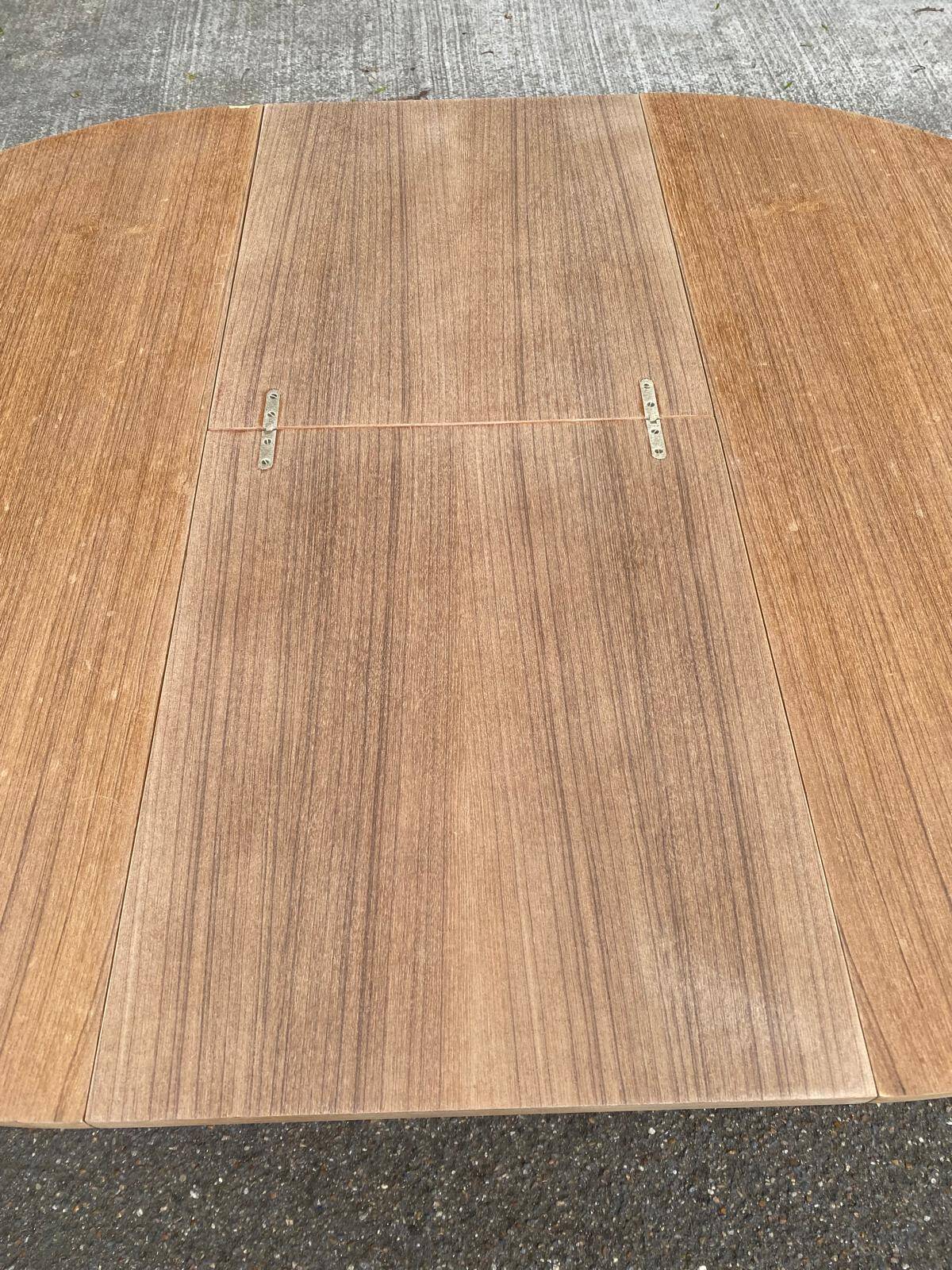 Renovated round extendable Scandinavian dining table in teak, 110cm.