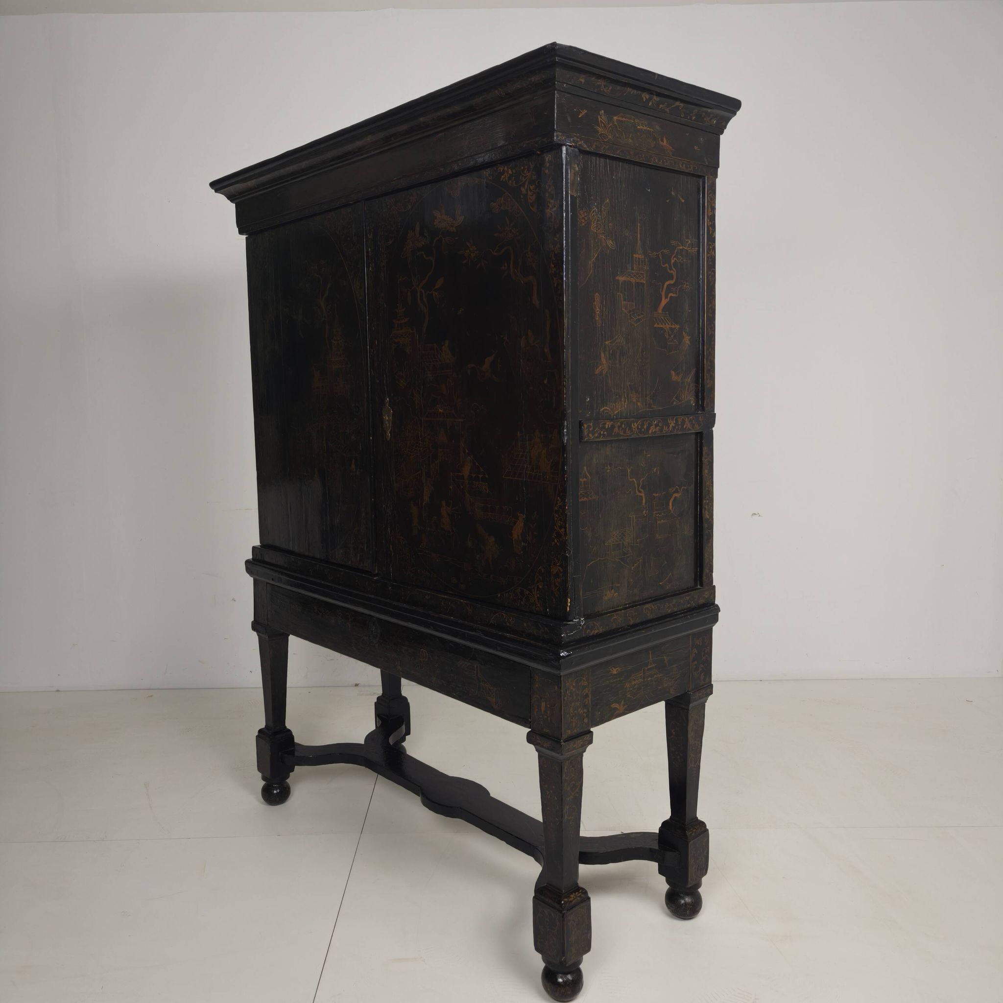 A rare early 18th-century Dutch japanned chinoiserie cabinet, circa 1700