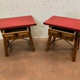 Paire de tables basses en bois naturel dessus en simili cuir rouge XX siècle