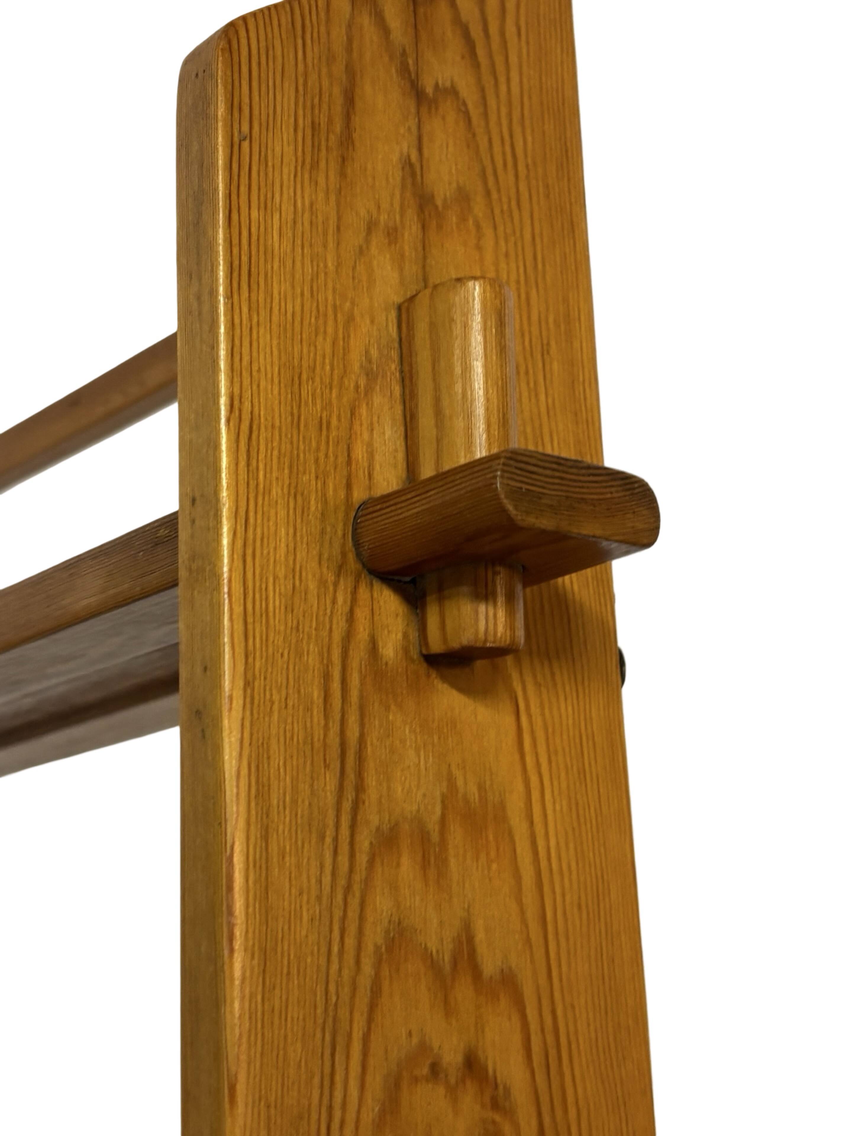 Vintage wooden wall shelve rack bookshelf in pinewood minimalist design