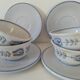 Glazed earthenware cups and saucers