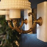 Pair of curved alabaster and bronze appliques