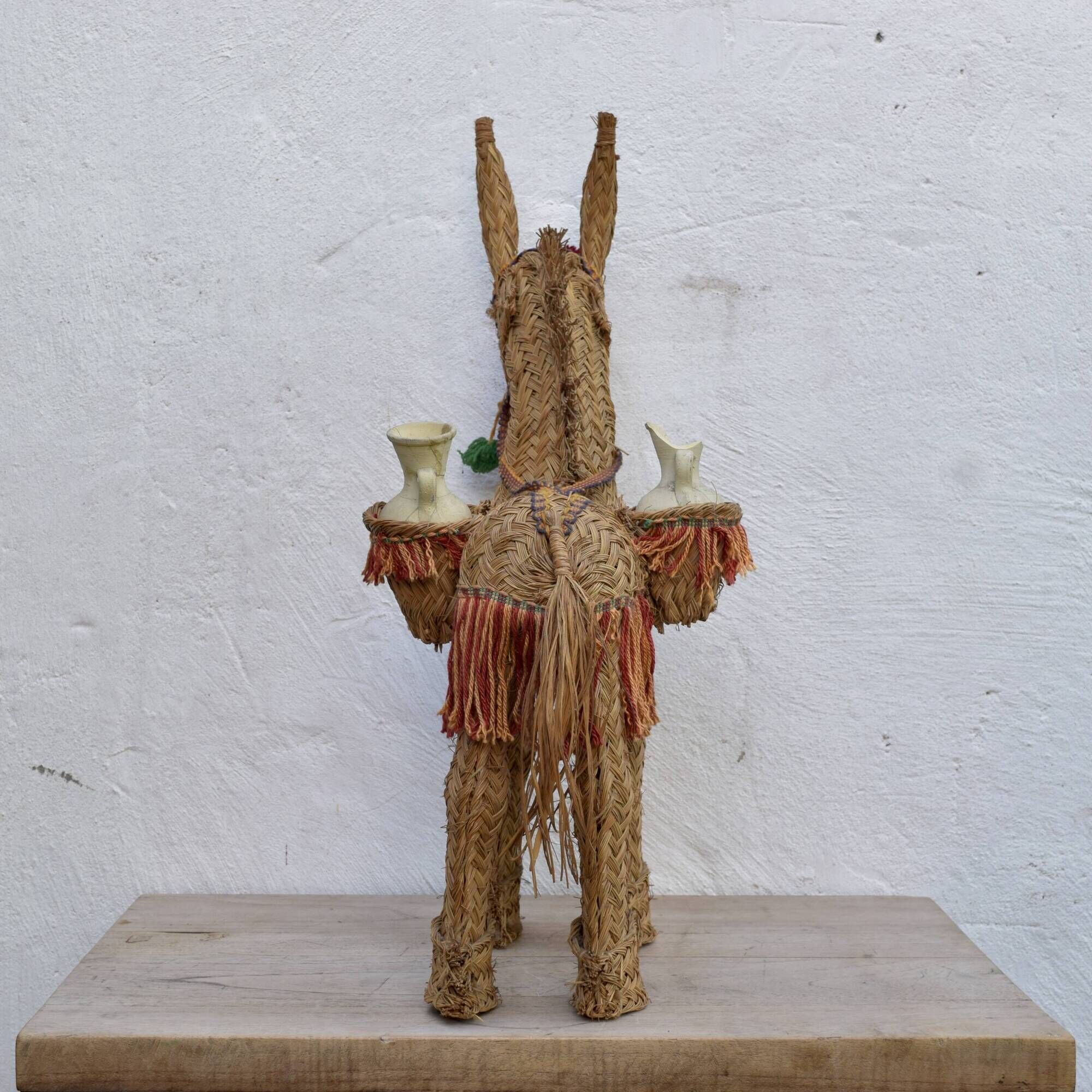 Spanish decorative donkey in raffia carrying two jars - 62 cm high - 1950