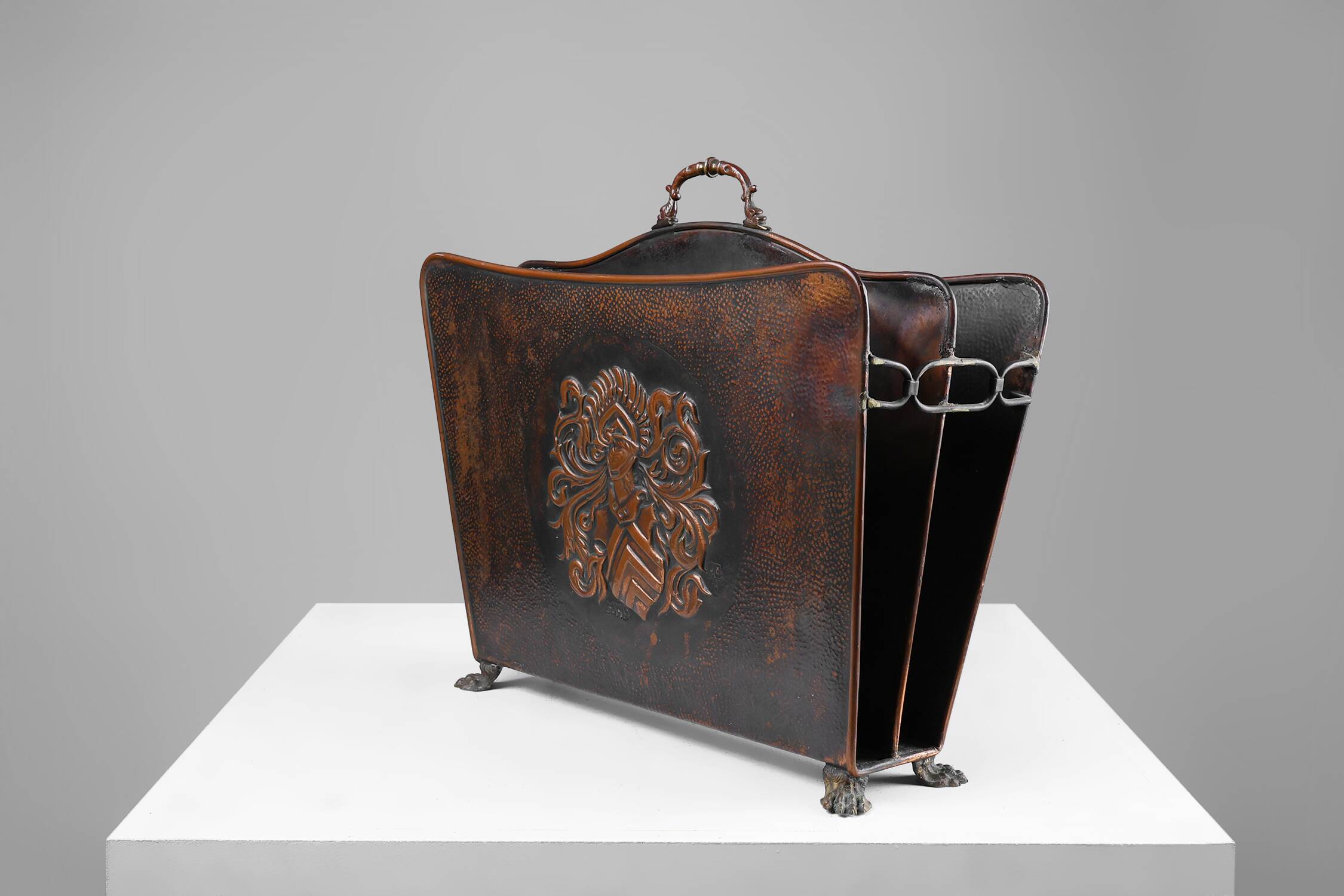 Mid-century magazine rack in hammered copper, France ca. 1900