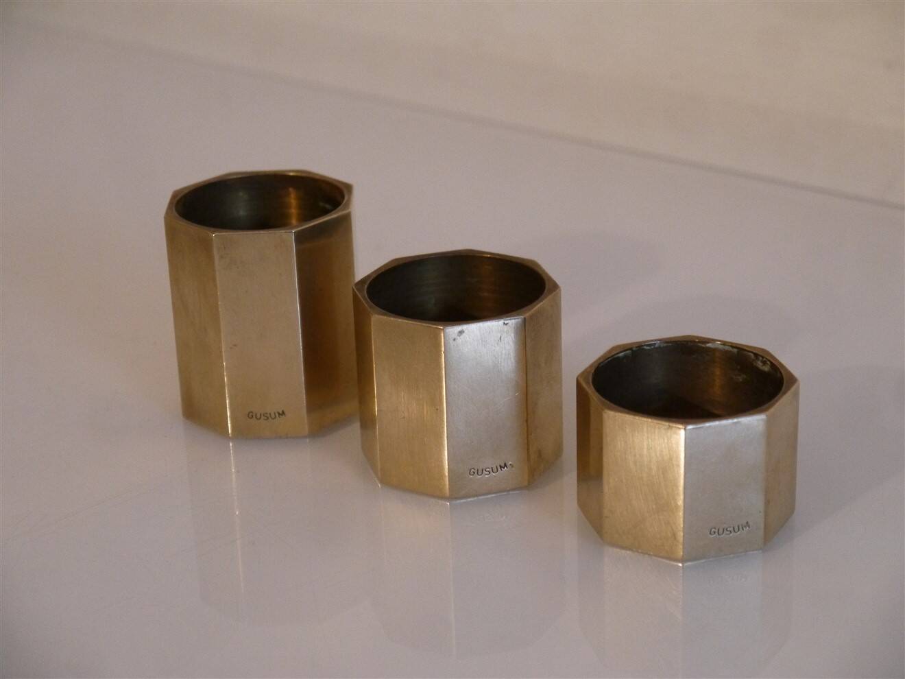 Set of 3 Swedish brass candlesticks