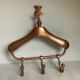 Coat rack gilded metal hanger varnished
