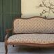 Moulded wooden bench with floral upholstery – Old-fashioned charm