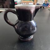 Antique tilted pitcher