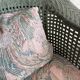Vintage wicker lounge chair with pastel cushions – 1980s