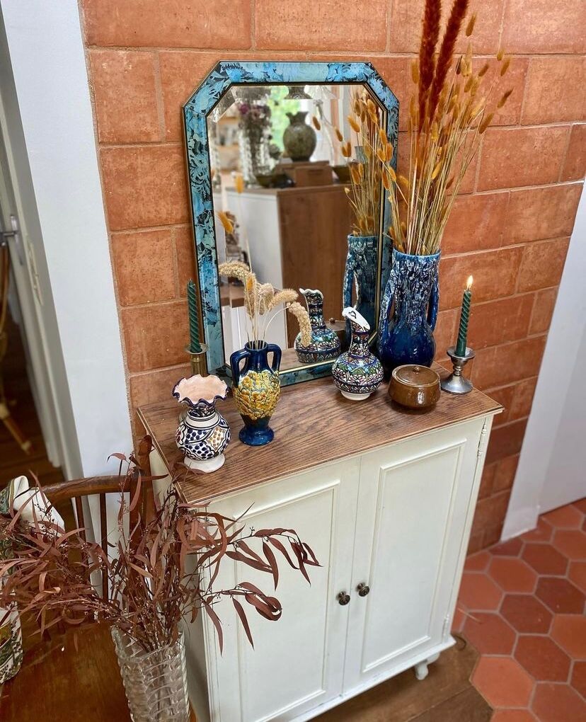 Old octagonal mirror beveled in painted wood, 68x48 cm