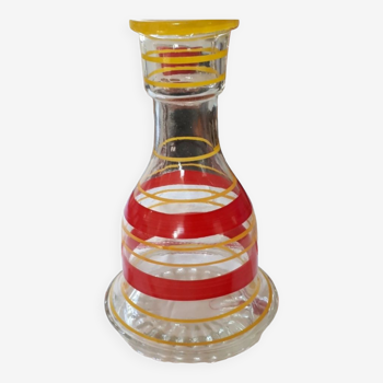 Vintage decanter with colorful stripes