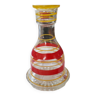 Vintage decanter with colorful stripes