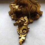 Baroque style golden shelf.
