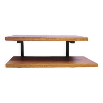 Wooden shelf with metal brackets