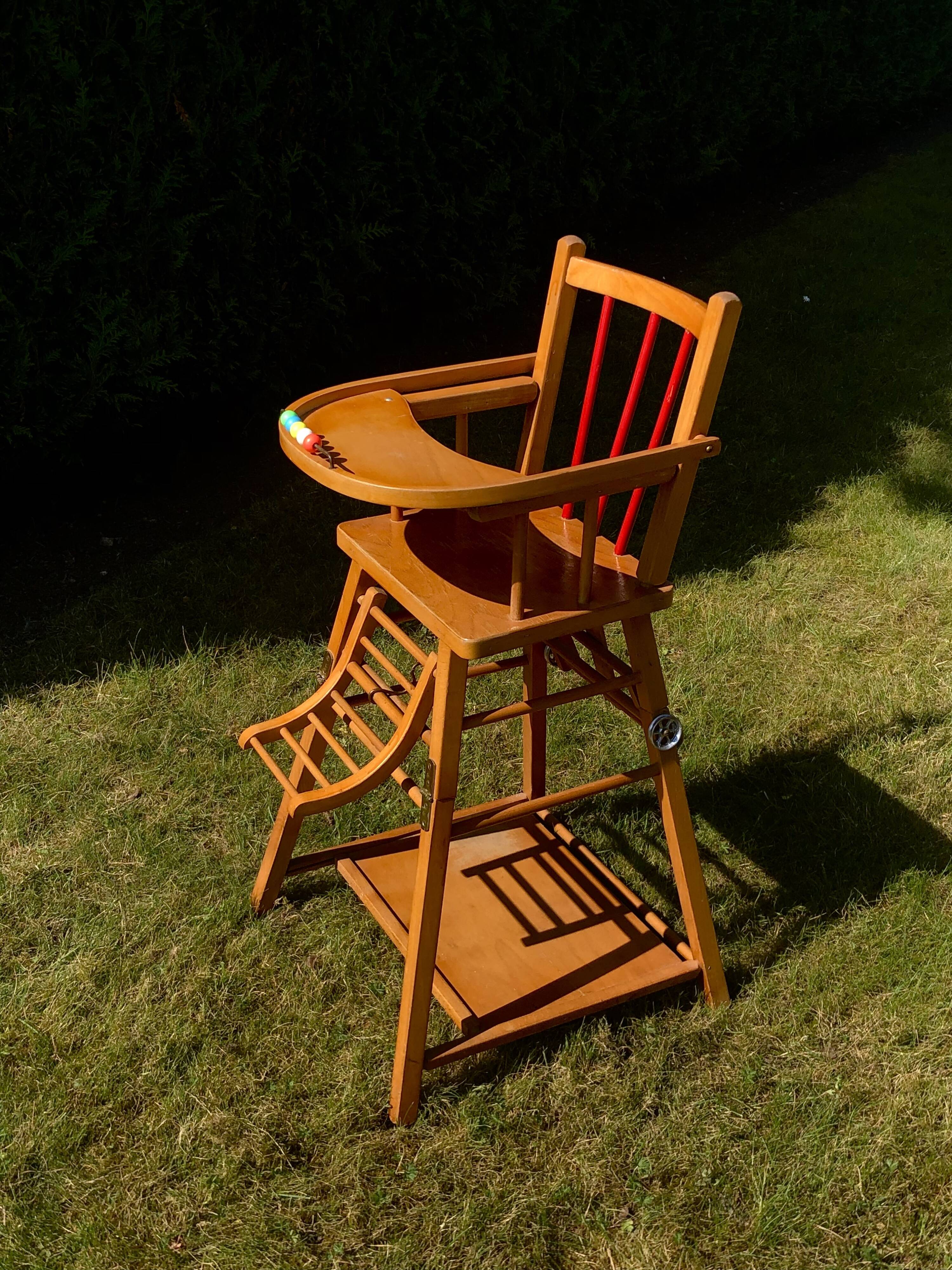 Vintage wooden children's high chair, convertible table