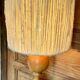 Turned wood base lamp with spun lampshade