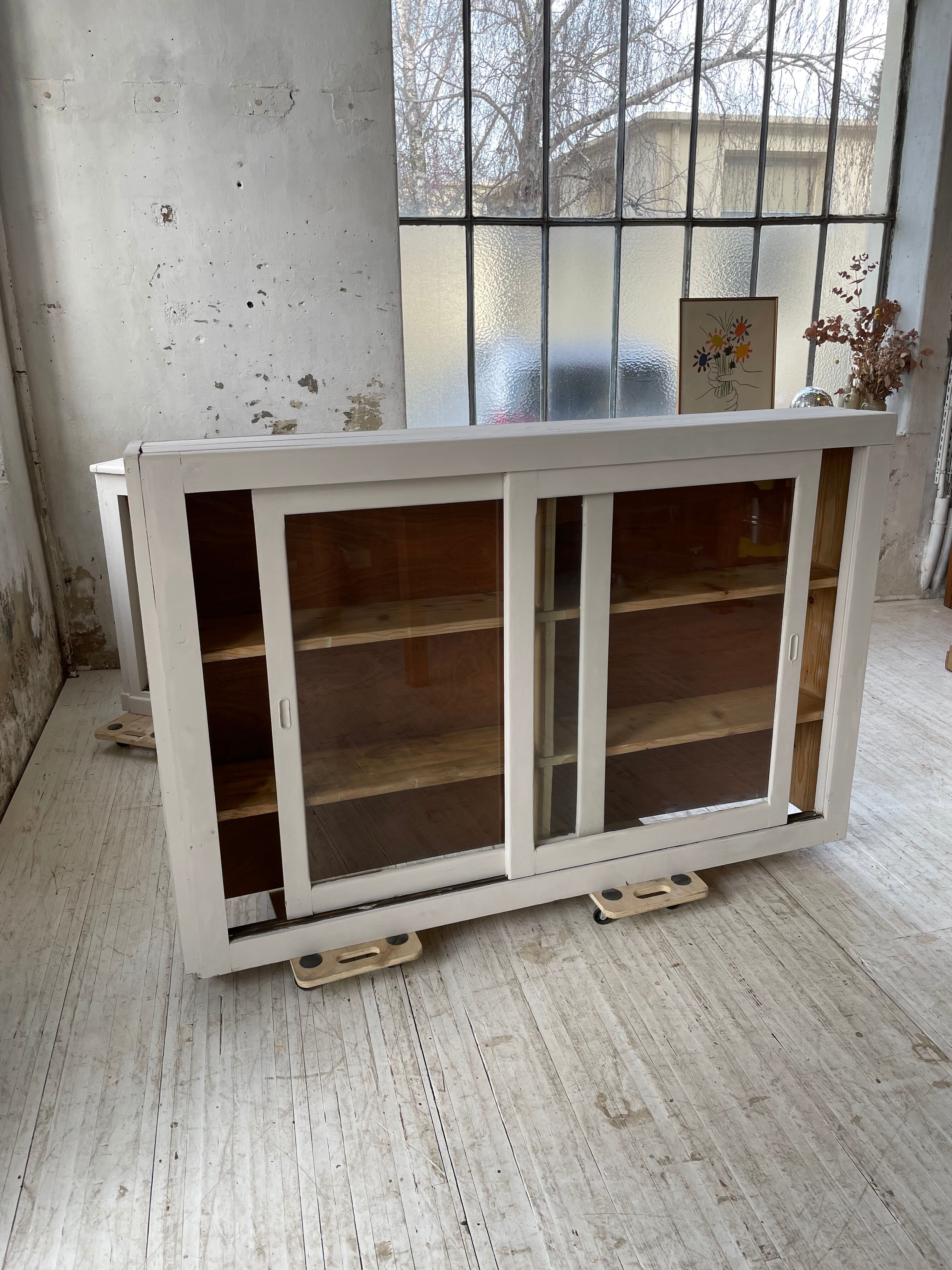 Library showcase ivory white sliding doors