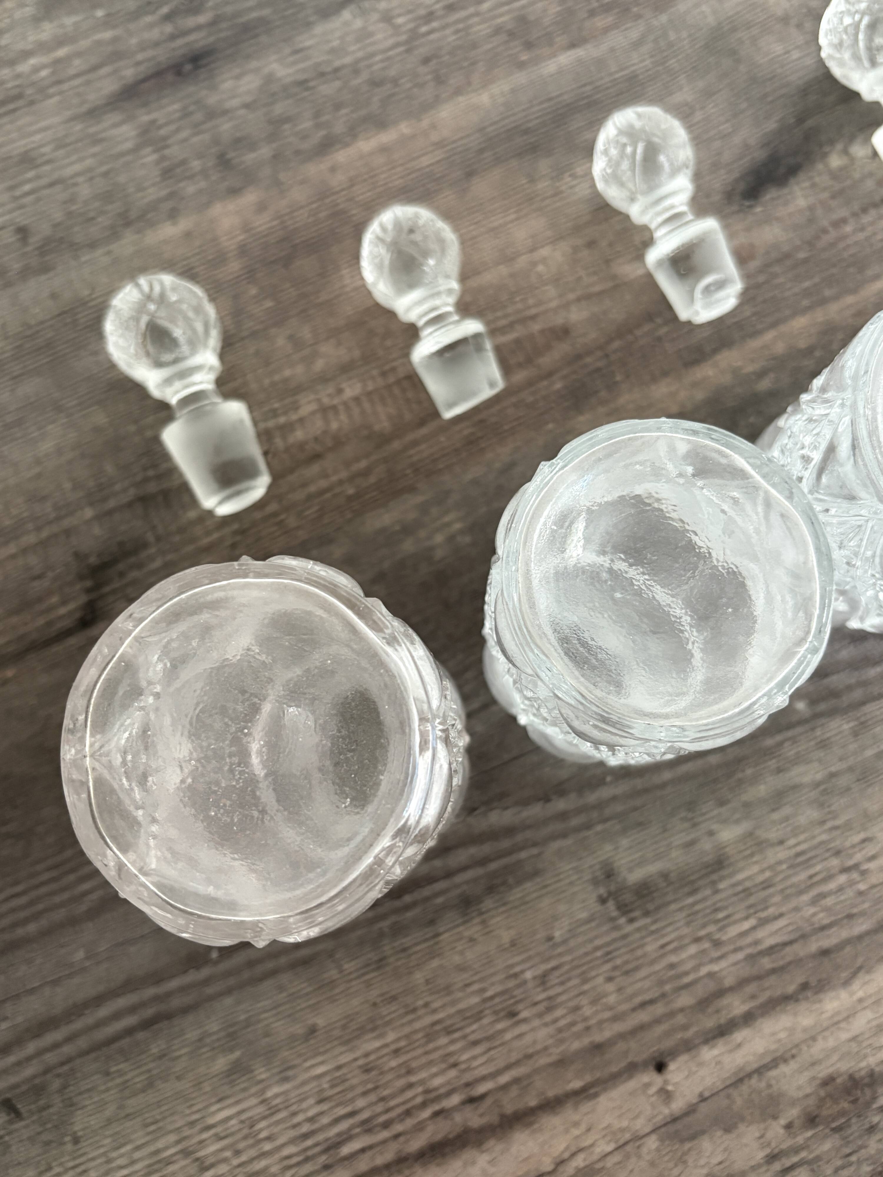 Set of 4 molded crystal bottles – Val Saint Lambert