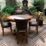 Round table type directoire green leather and its 4 chairs