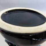 Praticality black and green vase numbered 666