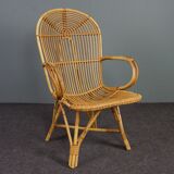 Rattan armchair with armrests by Rohé Noordwolde