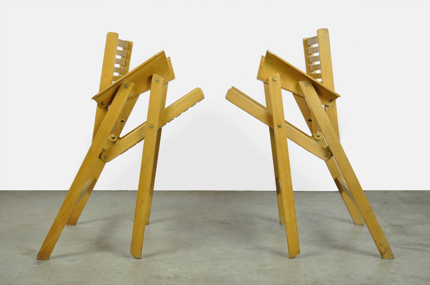 Original vintage foldable dining chairs by the Slovenian architect Niko Kralj (1920-2013) for Stol