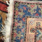 Old sinkiang oriental rug handmade 68 x 139 cm