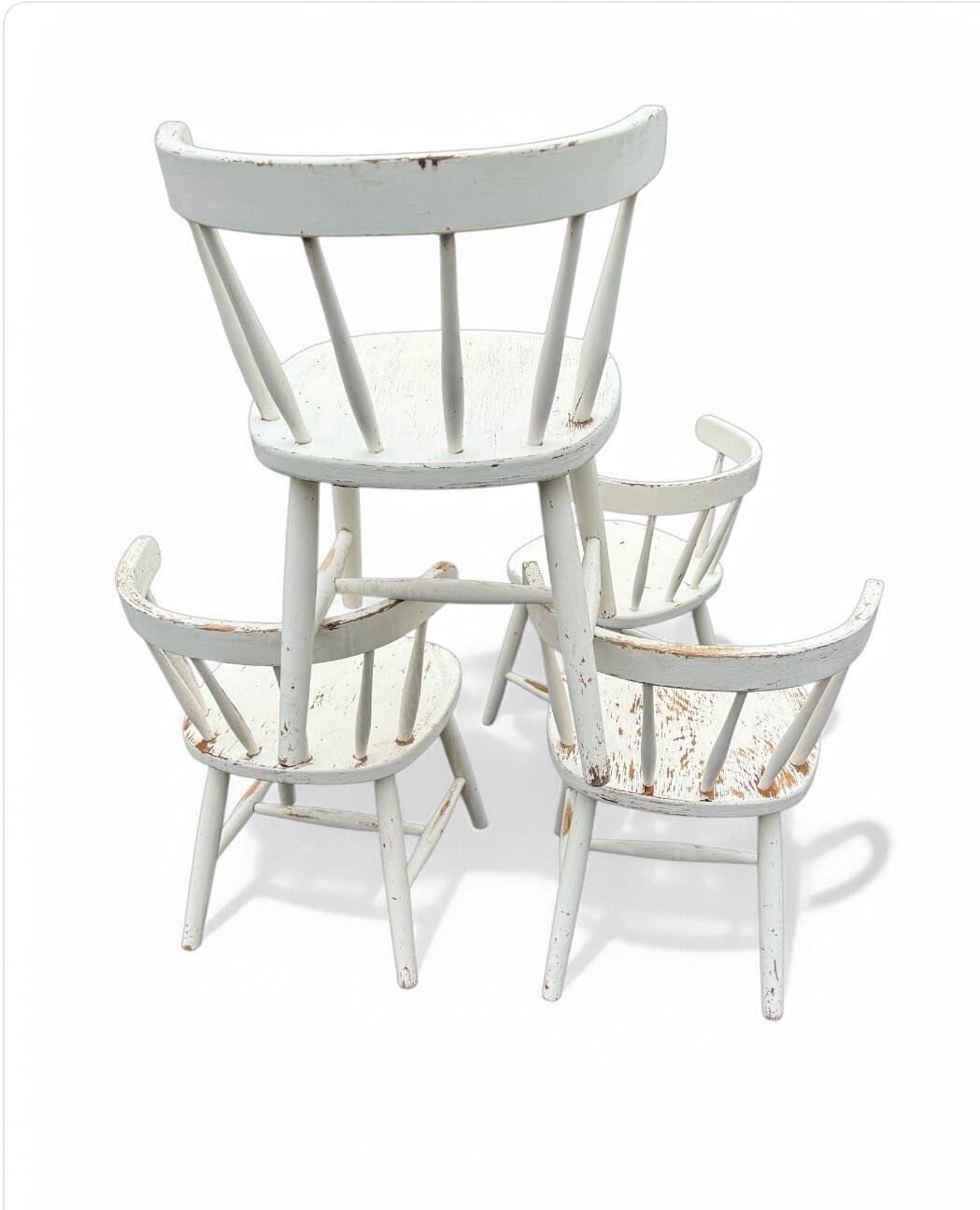 Set of 4 vintage Scandinavian chairs in solid wood.