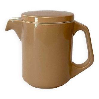 Brown ceramic pitcher