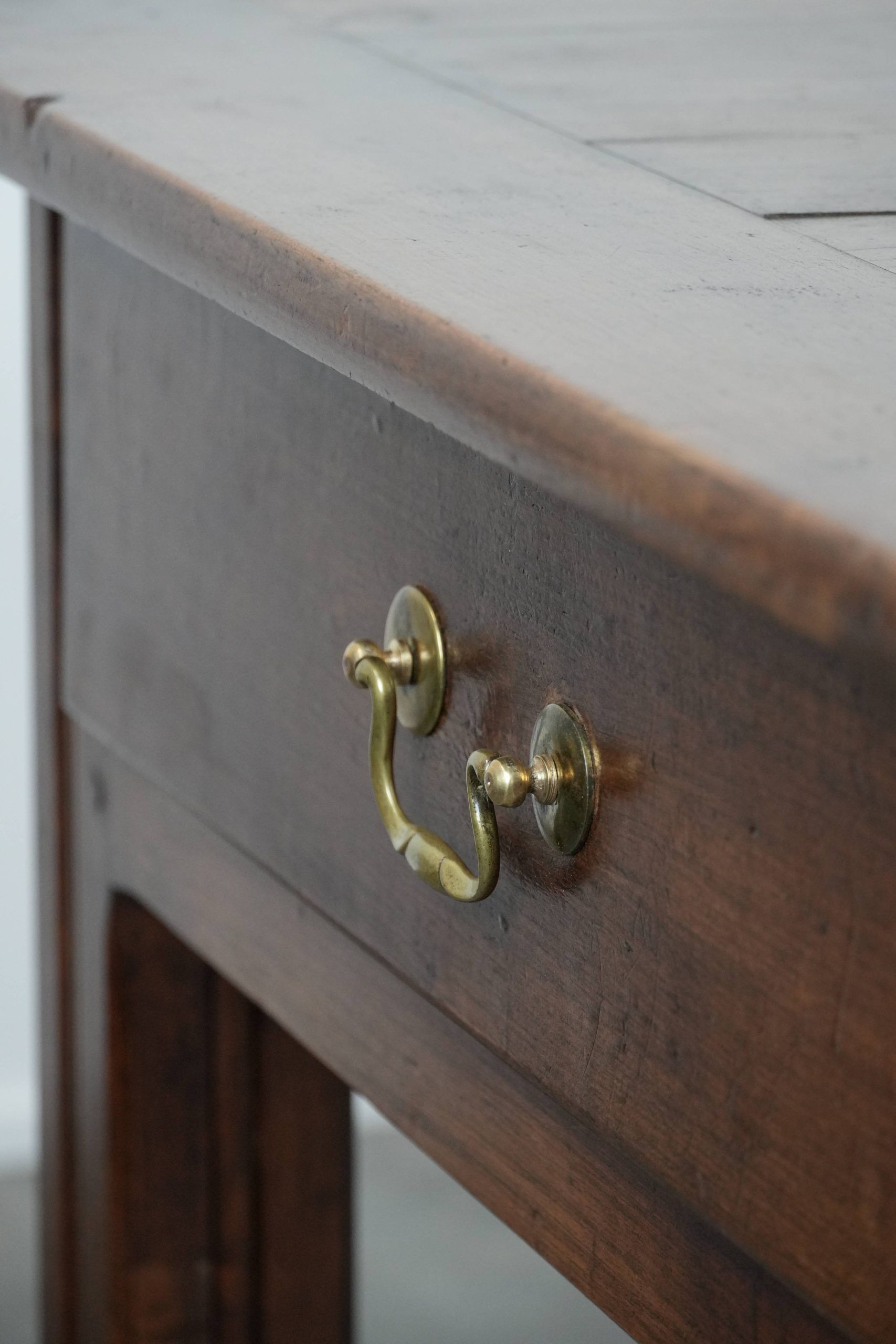 Antique French farmhouse dining table with two drawers and a pull-out board