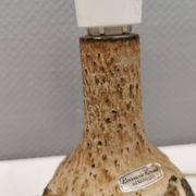 Small beautiful ceramic table lamp in earth colors.