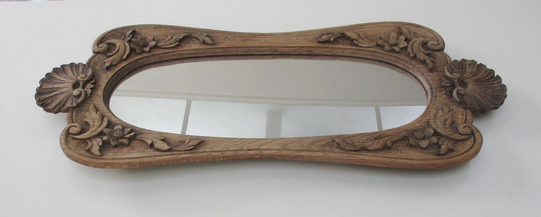 Antique carved wooden mirror