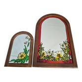 A pair of vintage stained glass style mirrors.
