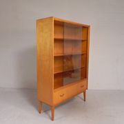 Vintage display cabinet with 2 sliding glass doors and 1 drawer, 1950s.