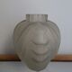 White frosted glass Art Deco vase with geometric patterns