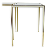 A pair of brass and white mirror tables from Vereinigte Werkstätten, Germany, 1970s.