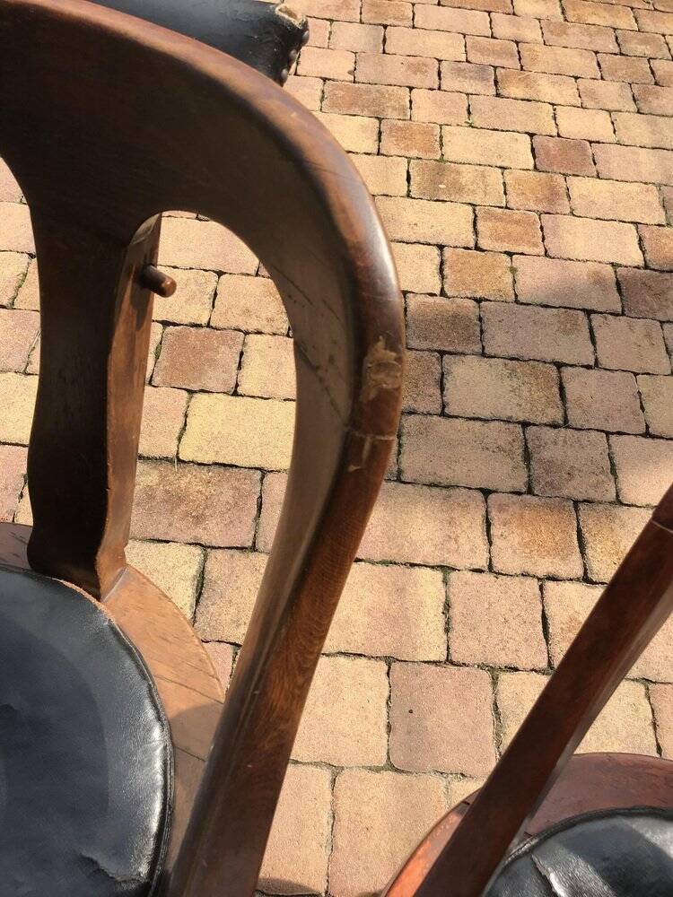 Pair of antique brown swivel armchairs in upholstery fabric, wooden frame, Hungary circa 1900.