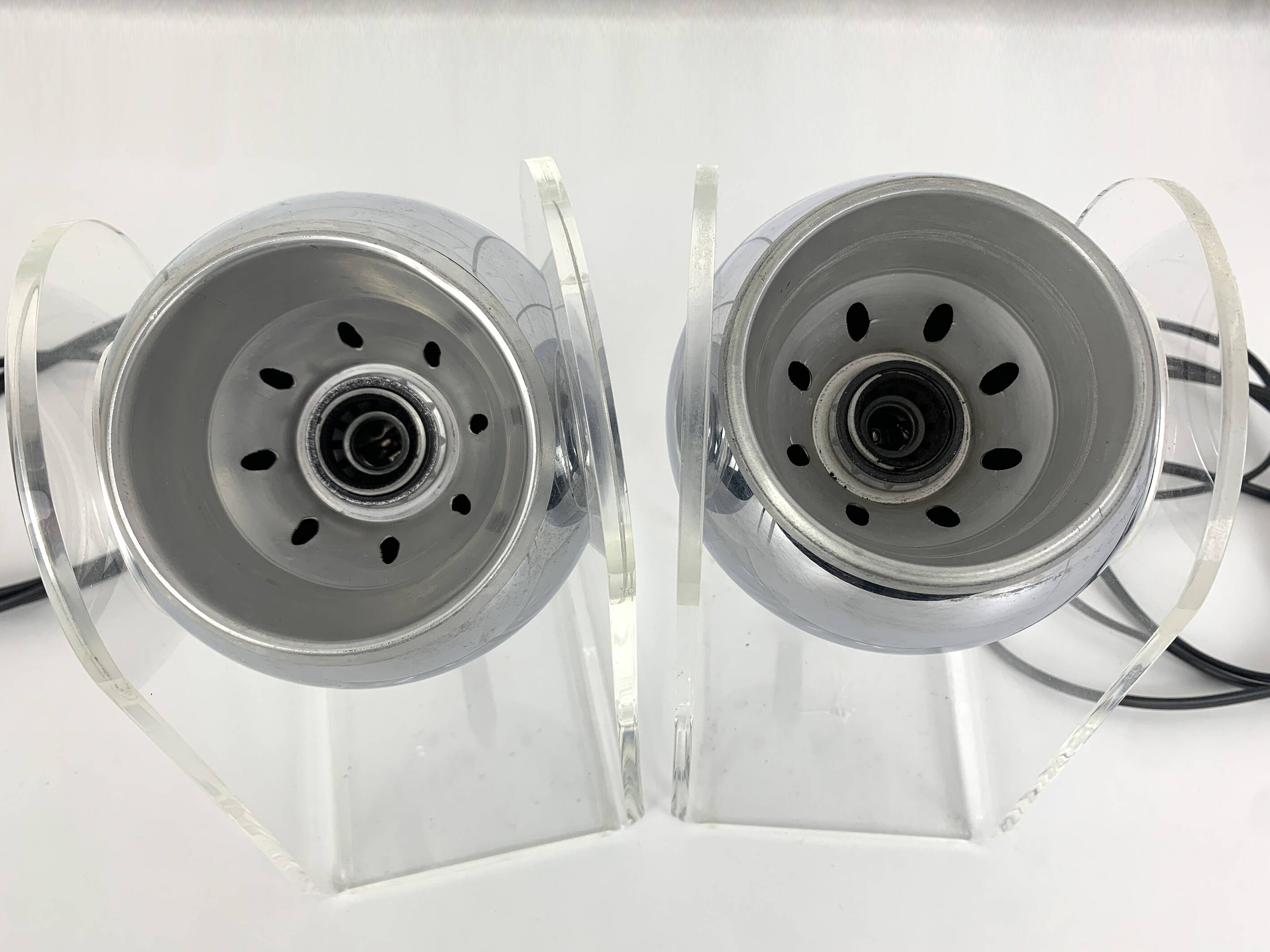 Pair of space age chrome plexiglass sphere table lamps from the 70s