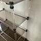 Vintage shelf in lucite, brass, and smoked glass from the 1970s.