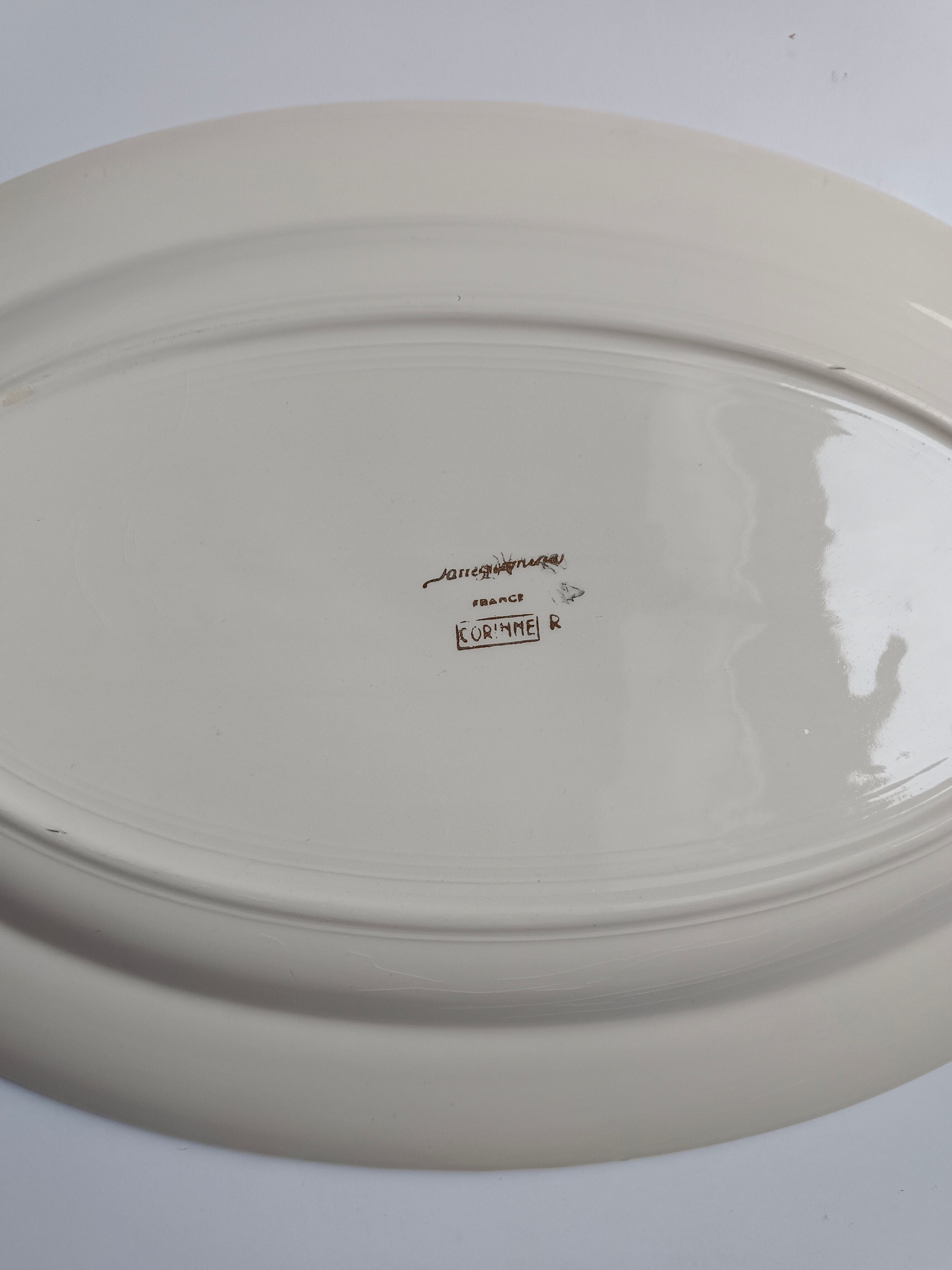 Oval plate Sarreguemines cream with pink gilding, antique.