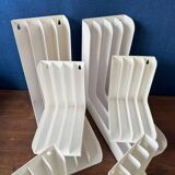 Set of 6 boomerang-shaped vinyl record racks/storage units. 1970s/80s.