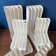 Set of 6 boomerang-shaped vinyl record racks/storage units. 1970s/80s.