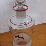 Glasses and carafe decorated with red Christmas reindeer and white granita 60's