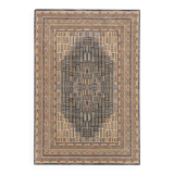 Black and beige Persian rug