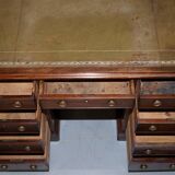 George III double-sided partner's desk in walnut circa 1780 with original handles.