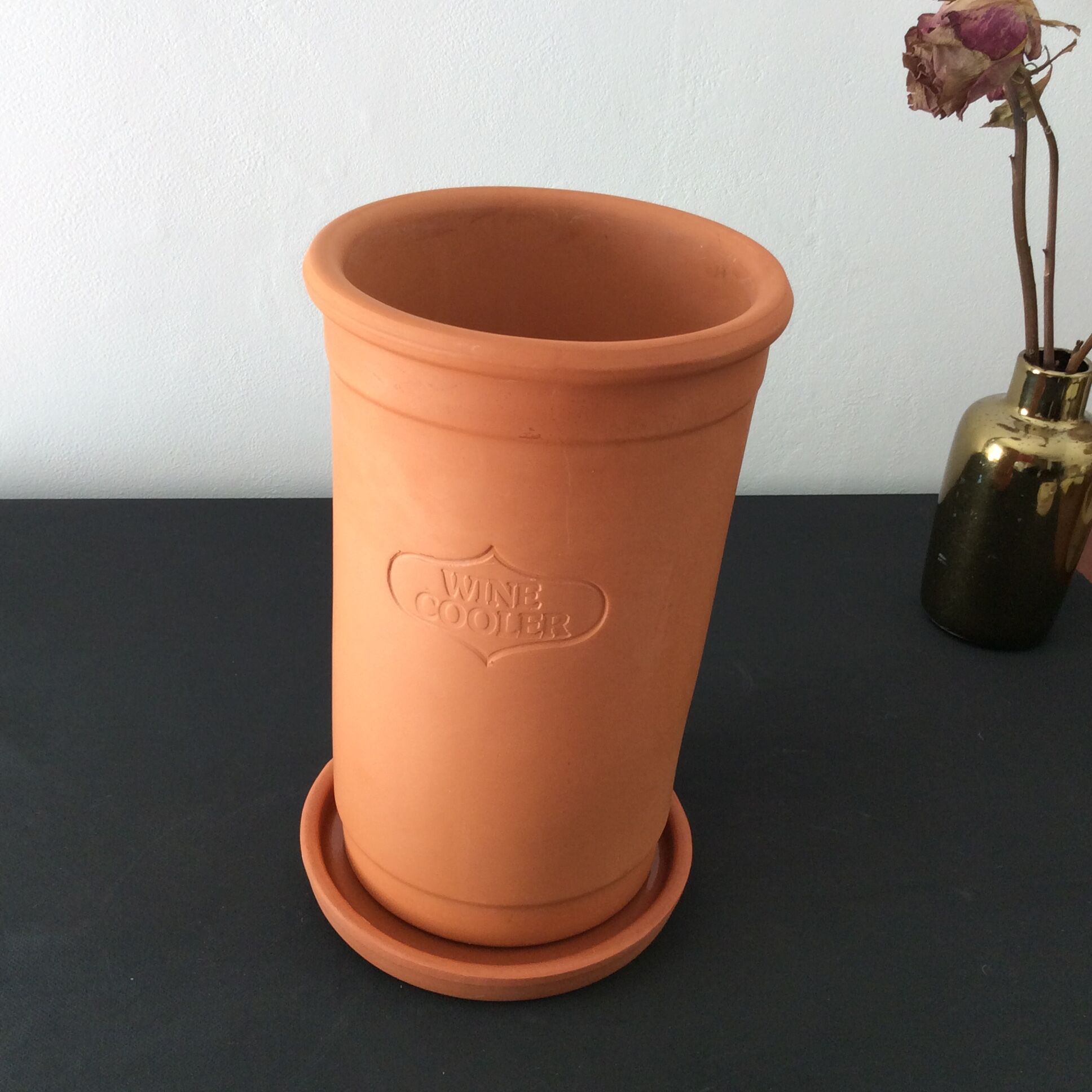 Wine cooler with terracotta saucer